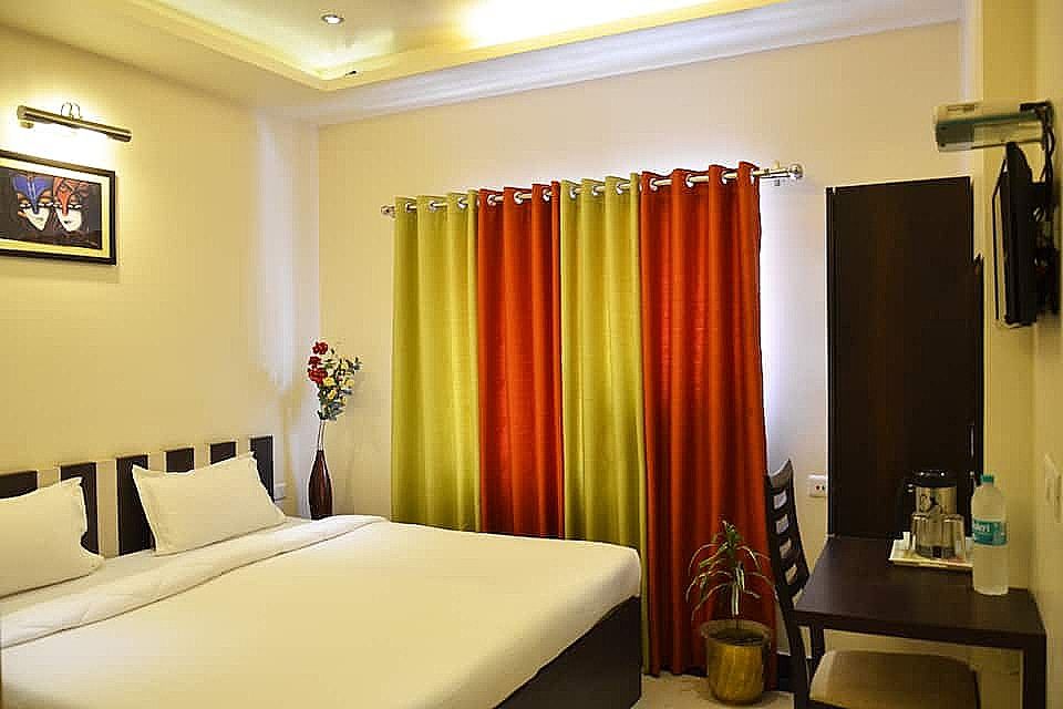 Divine Destination AC Deluxe Room 4